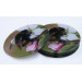 two buff tail bumblebee round glass coasters, queen on apple blossom image, tilt view