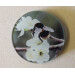Buff tail bumblebee round glass coaster, queen on wild plum blossom